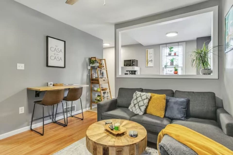 A large flat-screen TV with streaming services awaits, ensuring you have a variety of entertainment options at your fingertips. Gather around for a cozy movie night or catch up on your favorite shows.