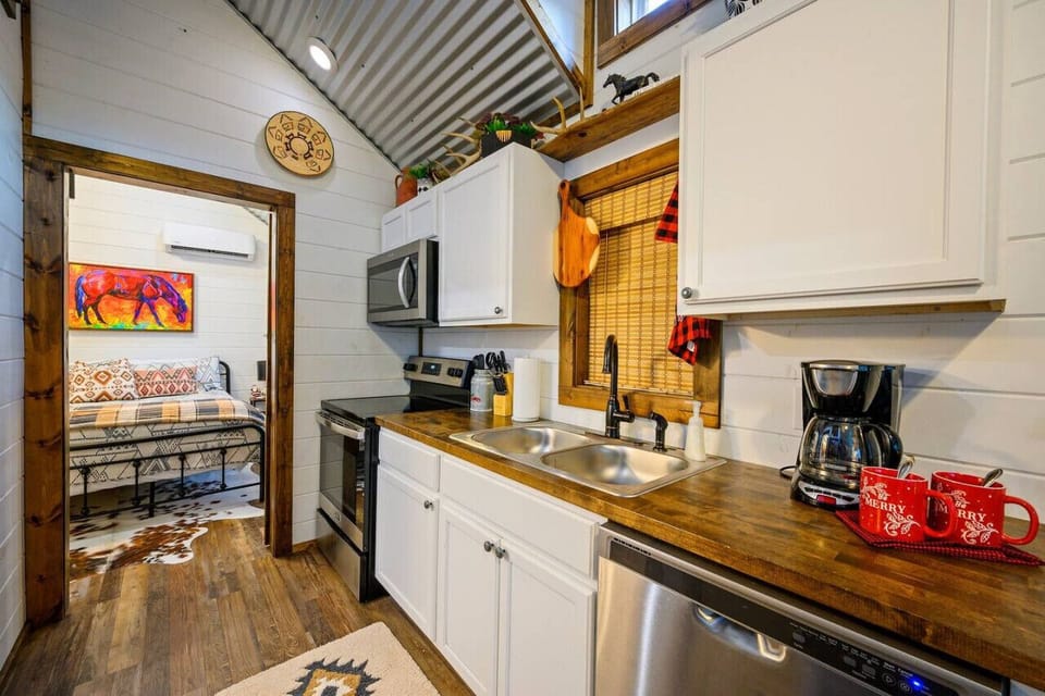 Rustic charm meets culinary delights in our cabin kitchen.