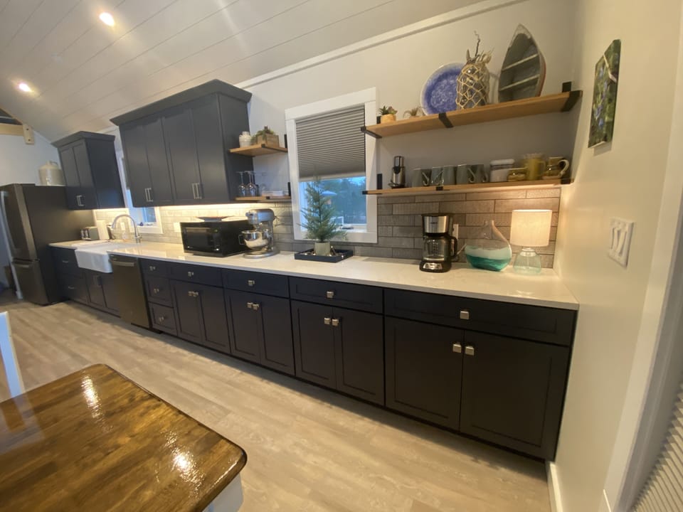 Kitchen fully stocked with cookware, bakeware & serving ware.  A cook’s delight 