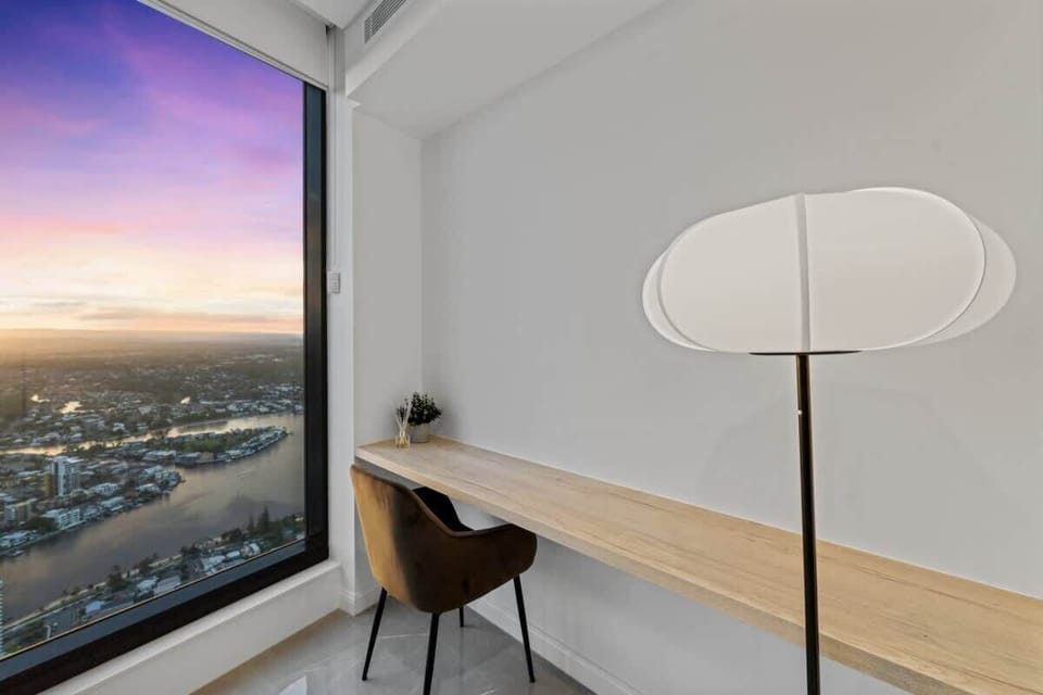 Savor your work at a custom-made desk while indulging in an amazing sunset view.