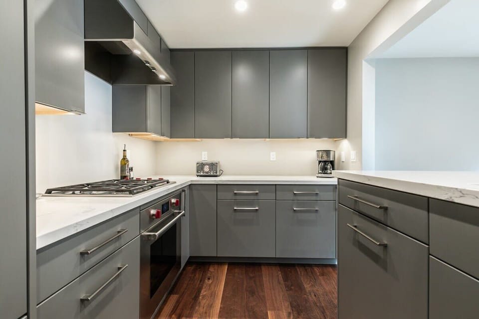 The fully-equipped kitchen has everything you need to prepare a delicious meal with high-end appliances and a kitchen bar with three bar stools.