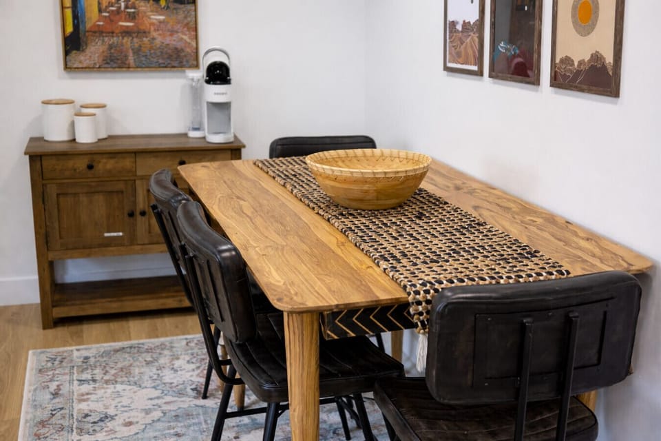 Dining area with table and chairs.