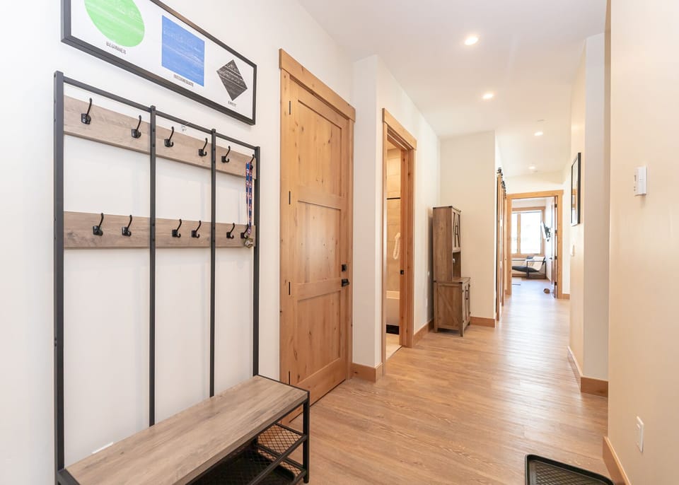 Entryway with storage for shoes and coats