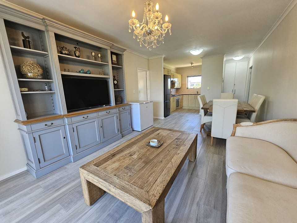 Apartment (1 Bedroom) | Living area | Flat-screen TV