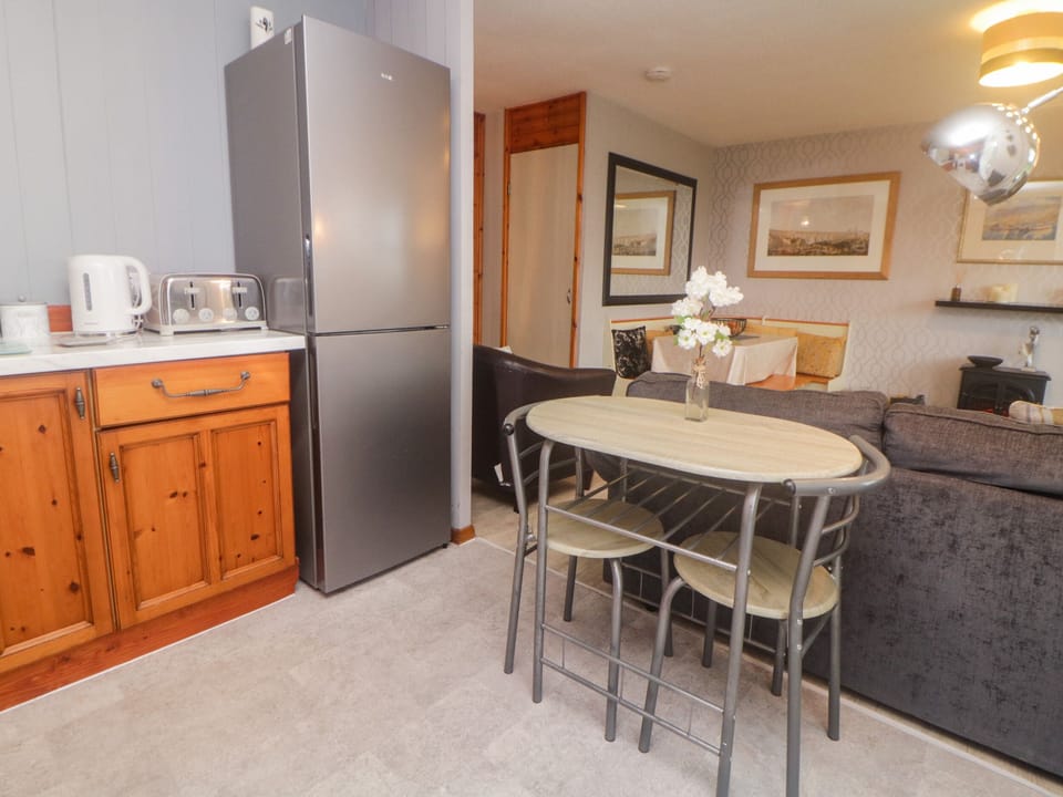 Fridge, electric kettle, toaster, cookware/dishes/utensils