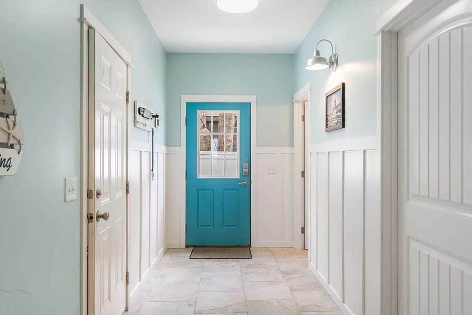 The Ground-level Hallway Leading to the Home`s Outdoor Shower Ensures that You Keep Nature Outdoors