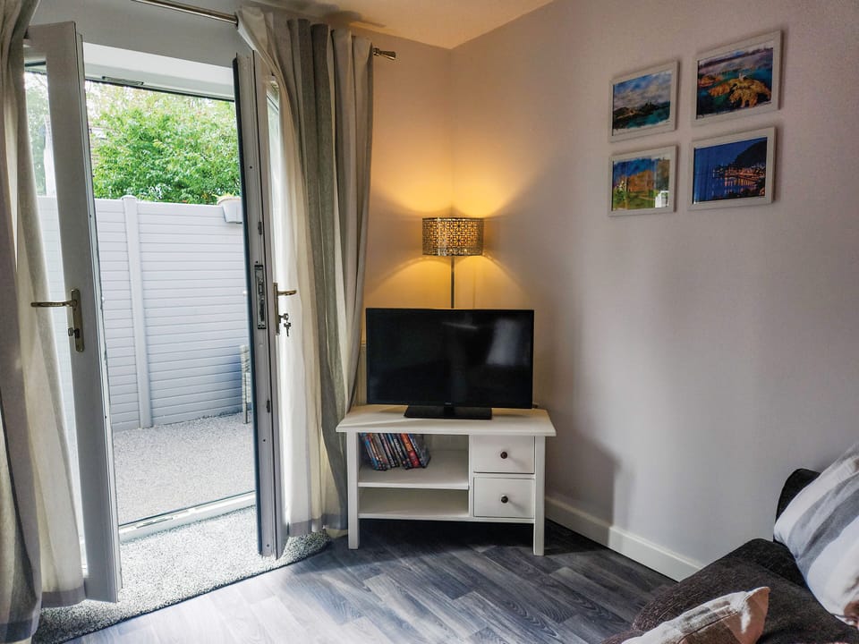 Standard Studio | Living area | 32-inch flat-screen TV with cable channels