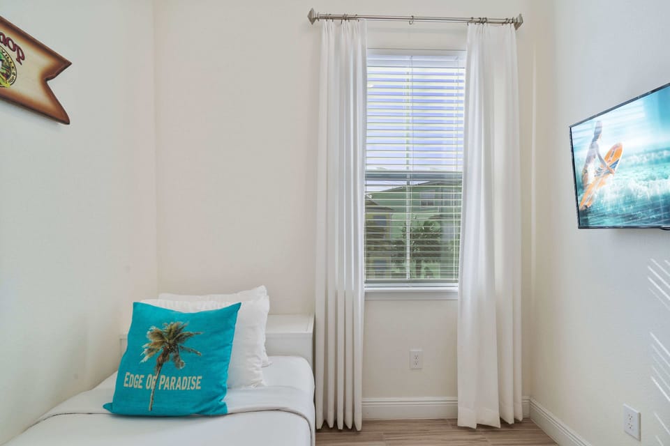 Cozy comfort awaits in Bedroom 4, offering a serene retreat with its single bed. Relax and unwind in this inviting space designed for restful nights.