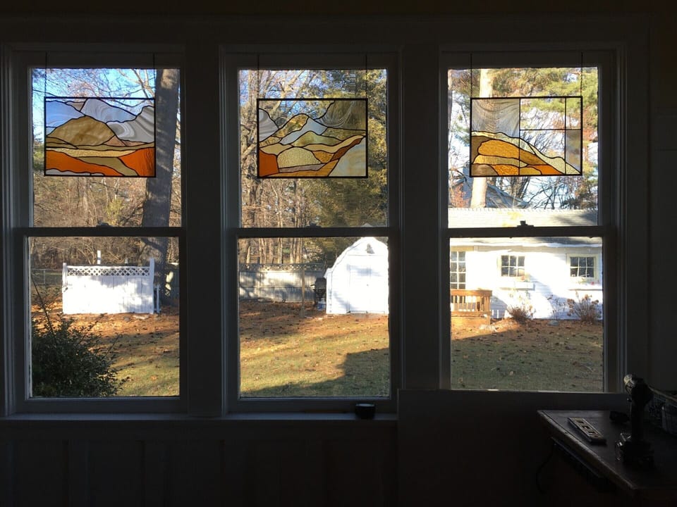 Lovely stained glass windows by property manager/artist Rosemary Brown.  