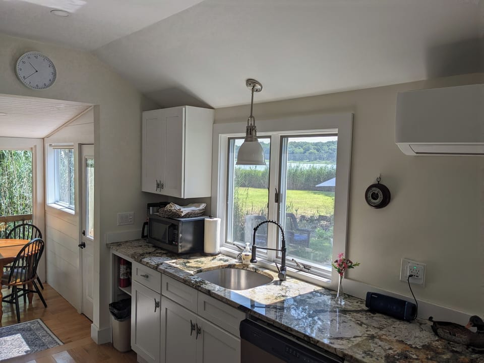 Kitchen looks out to Narrow River