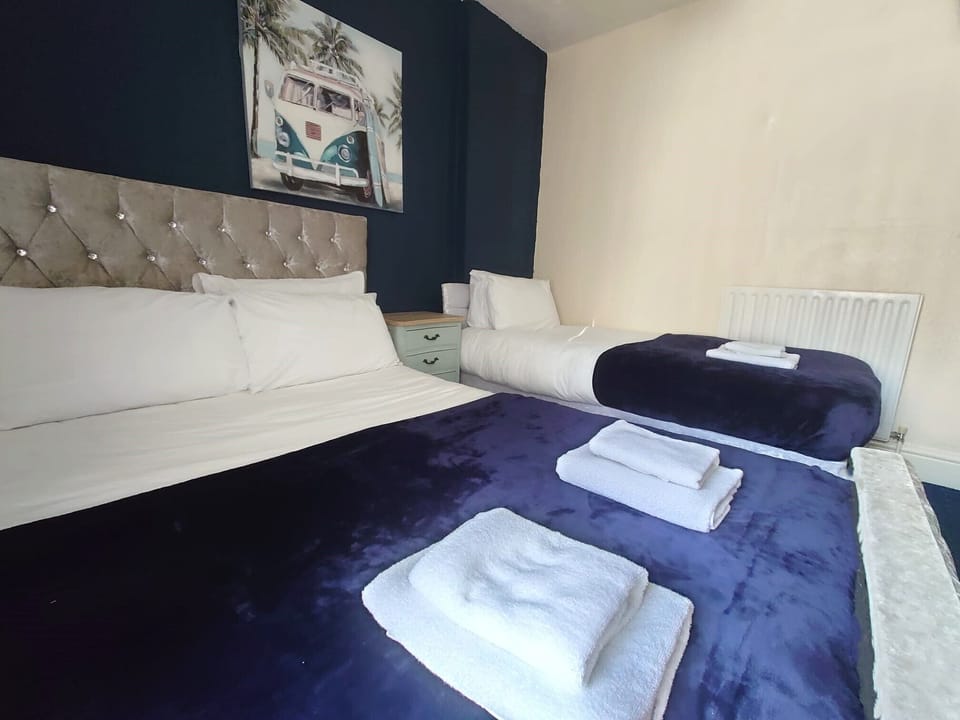 Family Room | Premium bedding, individually decorated, individually furnished