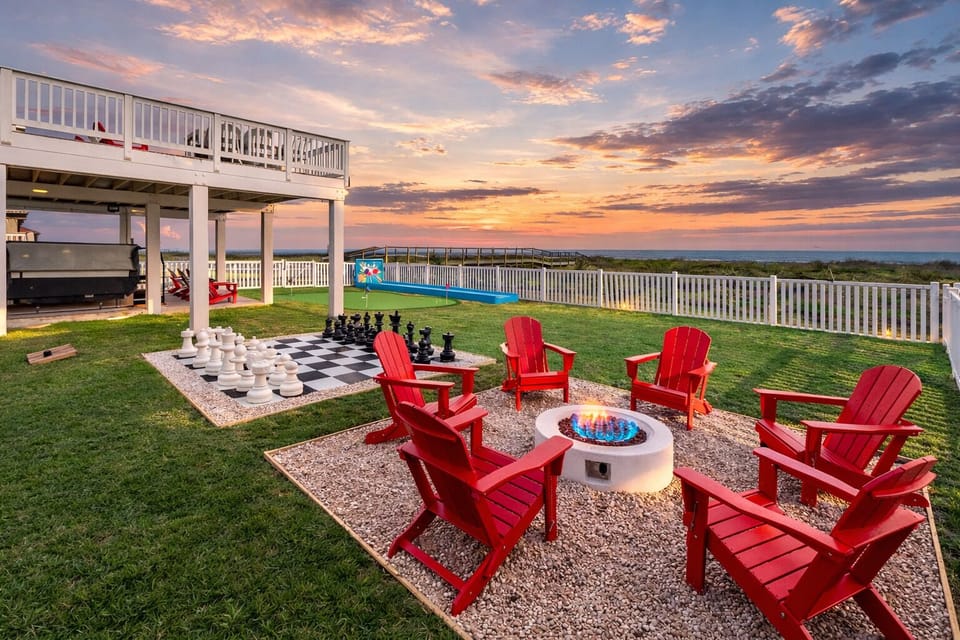Covered outdoor fire pit, life sized chess game and spacious yard area.