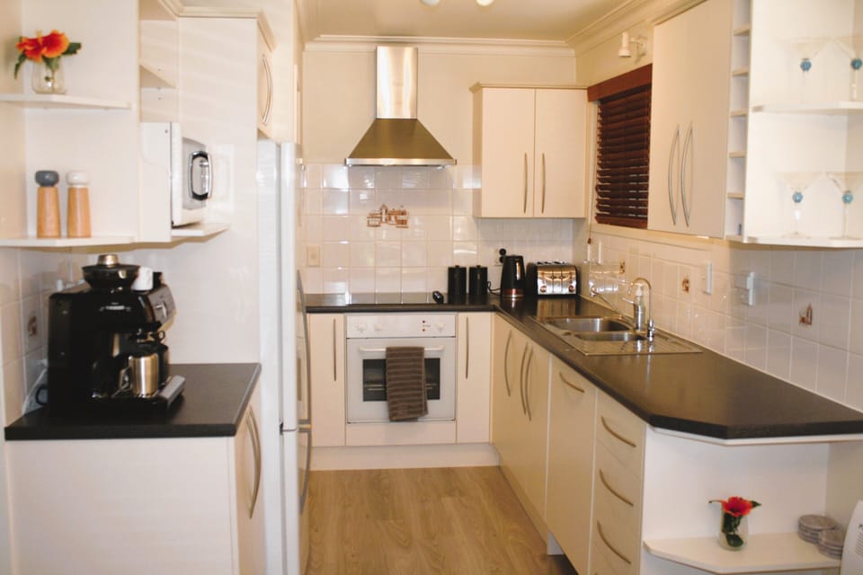 Kitchen that includes all the mod cons of home