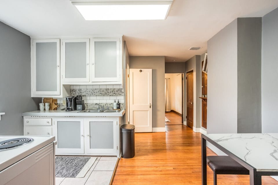 Embrace your inner chef in our sleek and fully-equipped kitchen. Whip up delicious meals and savor culinary adventures during your stay