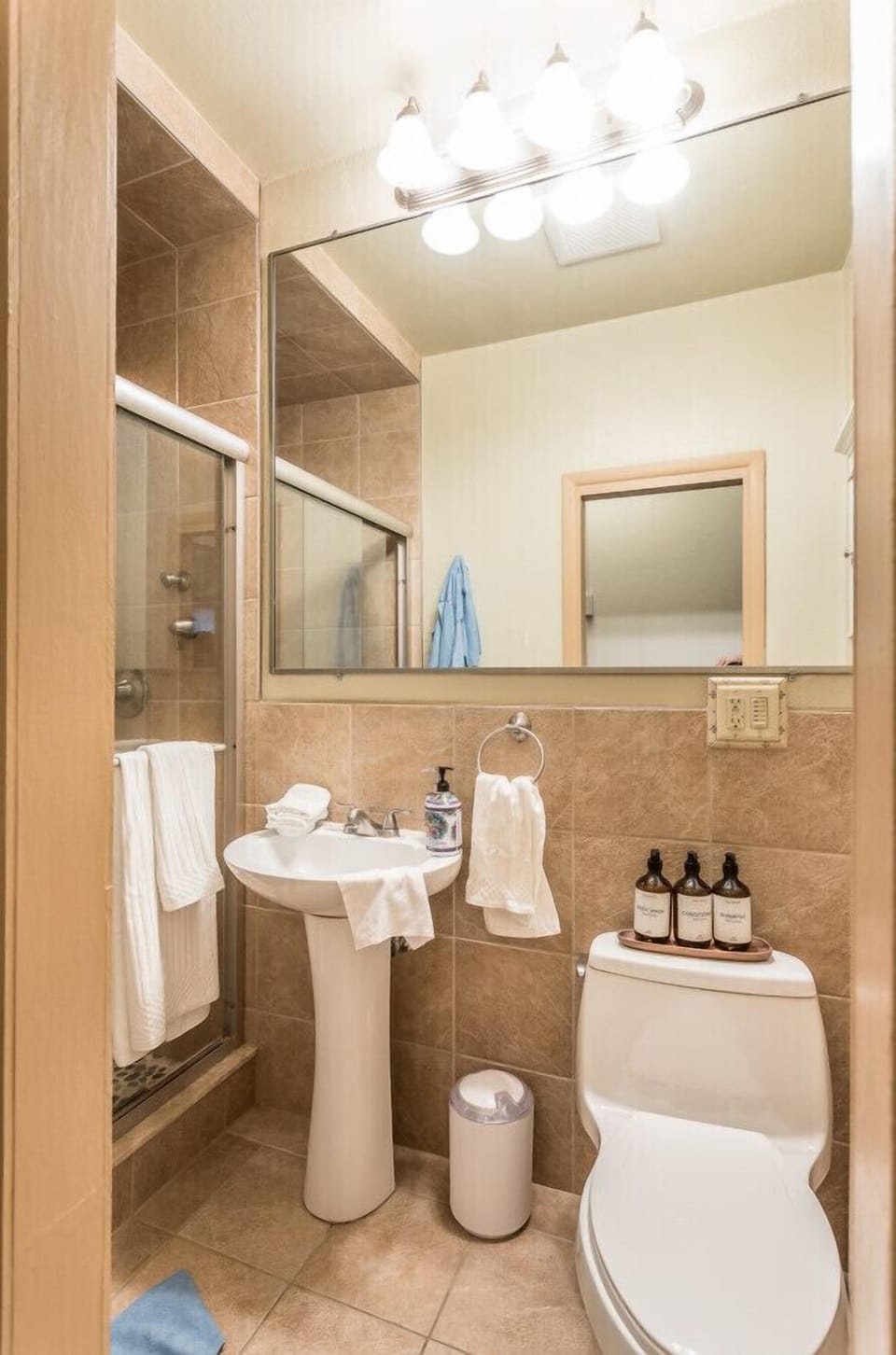 Refresh and rejuvenate in our modern shower, equipped with a luxurious waterfall shower head, providing a spa-like experience right in your bathroom.