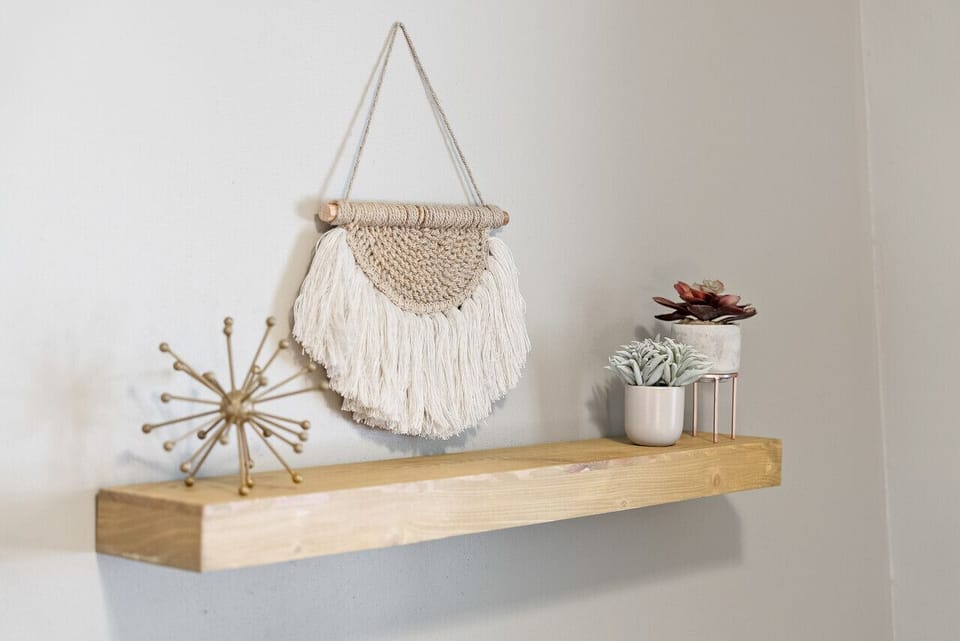 Charming wall decor adds a personal touch to your relaxing retreat.