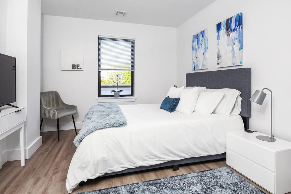 Queen bedroom with smart tv