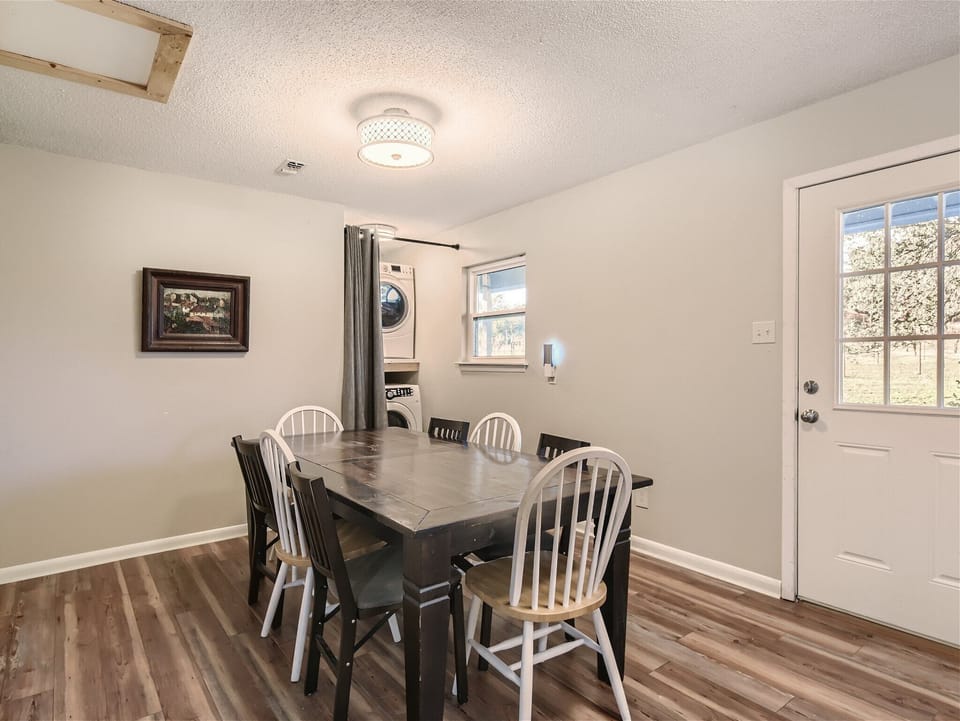 Ranch house dining table and laundry area