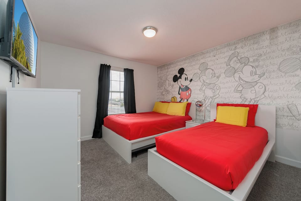 Mickey awaits at one of the kids bedrooms, with TV