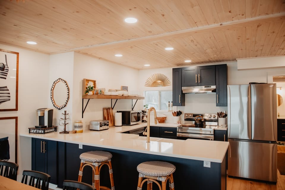 Cook, connect, and take in the views—this open kitchen flows right into the dining and living spaces.