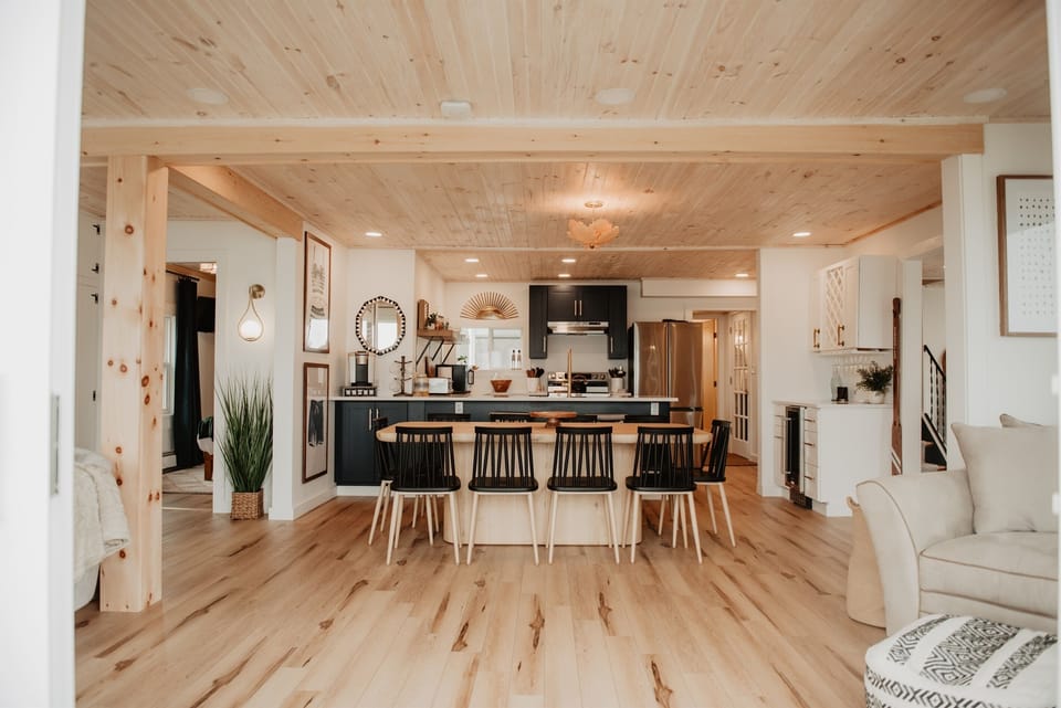 Gather, eat, and connect—this open dining room seats 8 comfortably and flows seamlessly into the rest of the home.