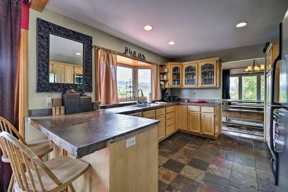Kitchen with river and mountain views.
