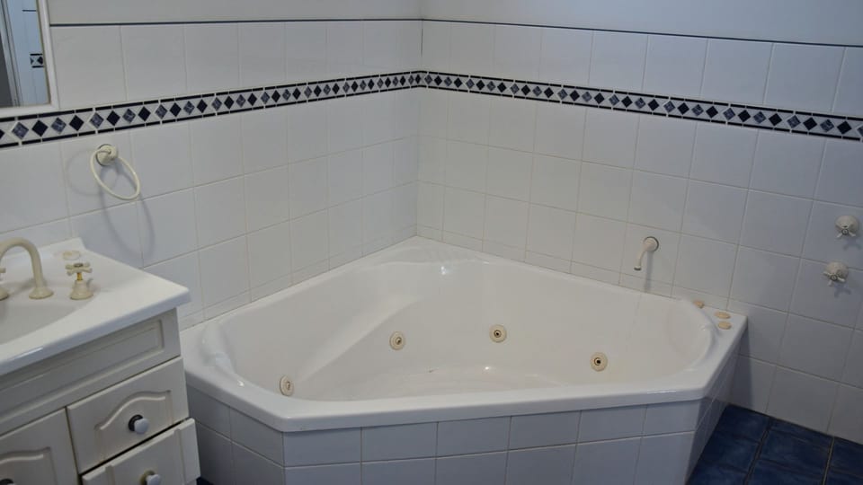 Bathroom with spa bath.
