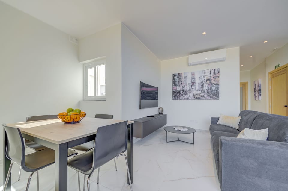 With its airy open-concept layout, our living area is the perfect place to unwind and enjoy quality 
