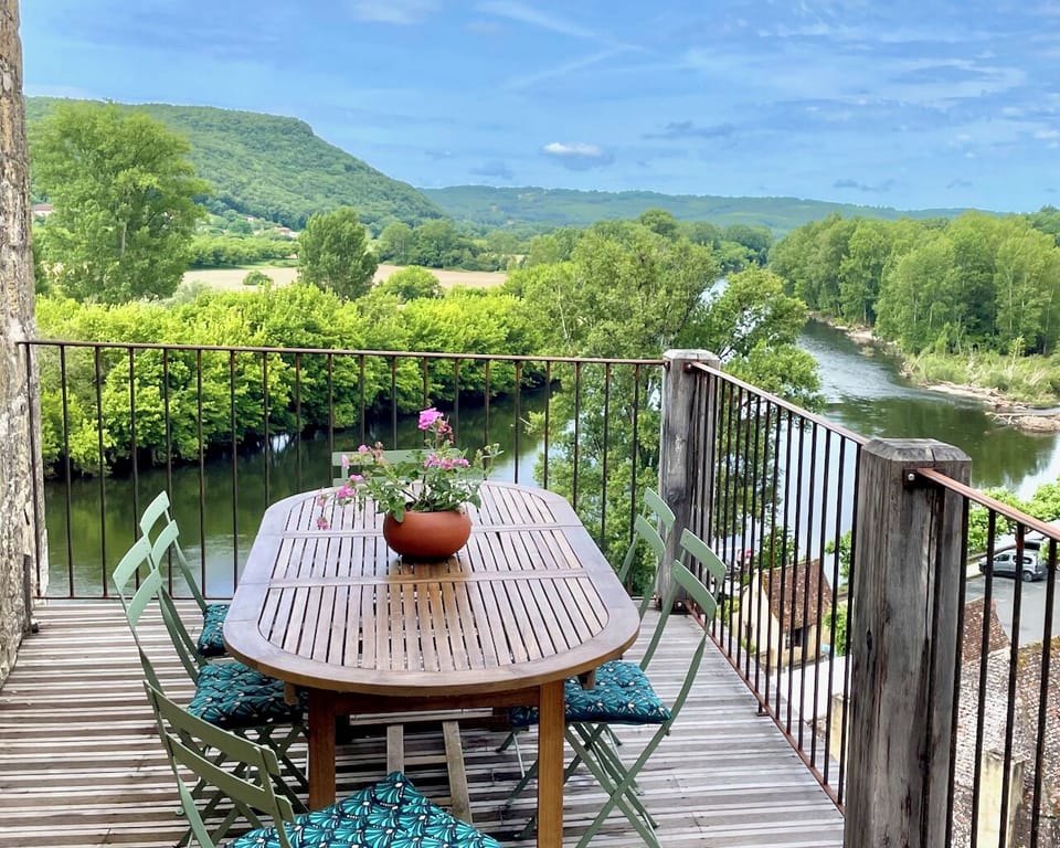 The upper balcony is a splendid outdoor living space for al fresco dining