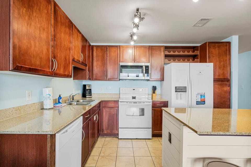 Full Size Kitchen with Lake Views and Island Bar Seating