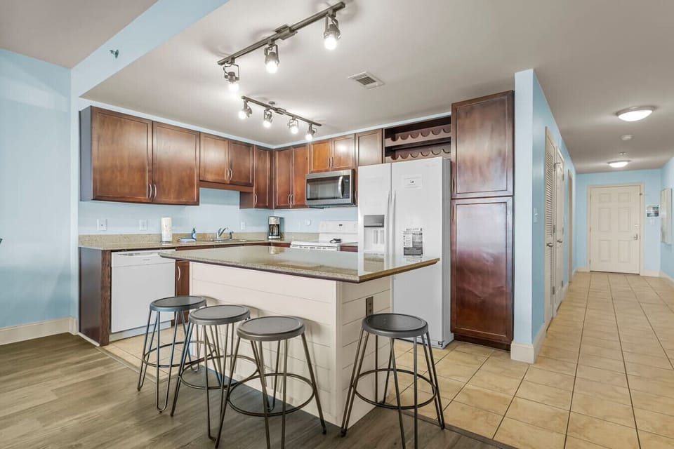 Full Size Kitchen with Lake Views and Island Bar Seating