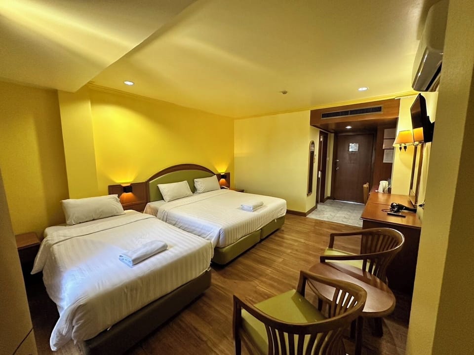 Family Triple Room, 1 Bedroom | Minibar, desk, WiFi (free), bed sheets