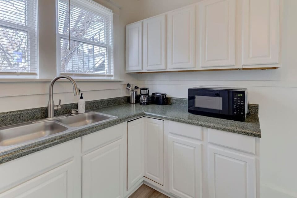 Experience the ease of home cooking with a spacious kitchen equipped for all your needs.