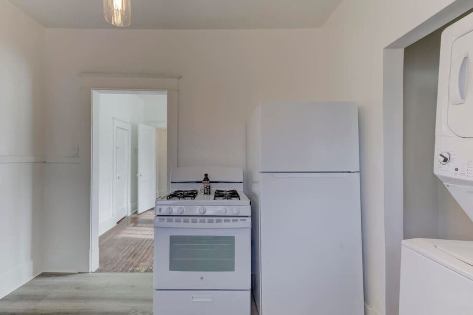 A well-lit, practical kitchen with everything you need for an effortless stay.