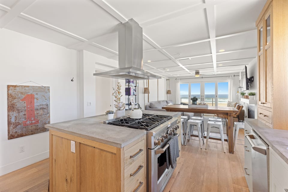 This open-plan Kitchen seamlessly integrates with the Living and Dining areas, creating the perfect space for interacting with family and friends.