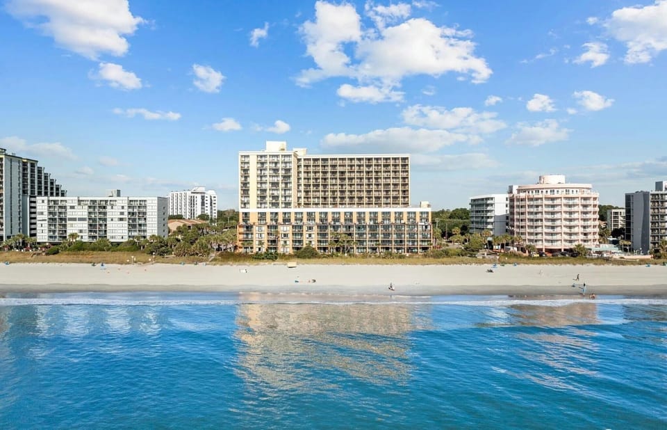 Peaceful view of the building overlooking tranquil blue waters
