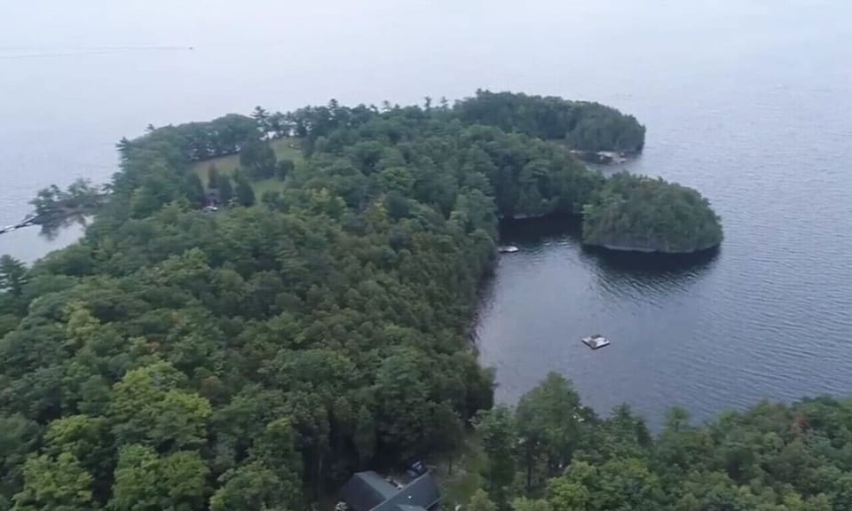 Birds eye of Lakehouse and private cove