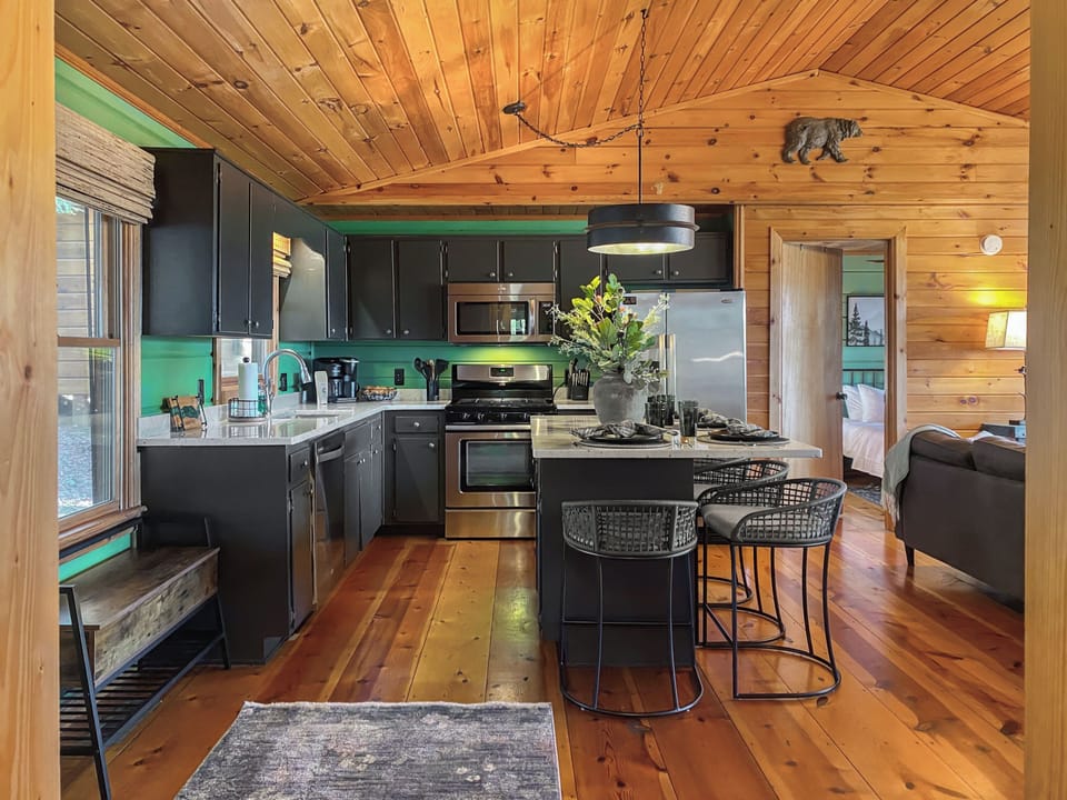...with seating for 4 at the designer granite island.