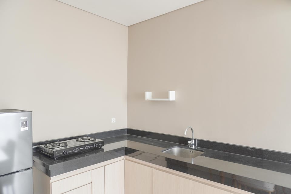 Apartment | Private kitchen | Full-size fridge, stovetop