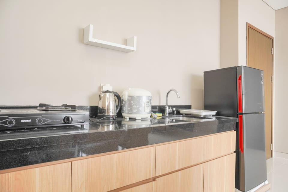 Apartment | Private kitchen | Full-size fridge, stovetop, dining tables