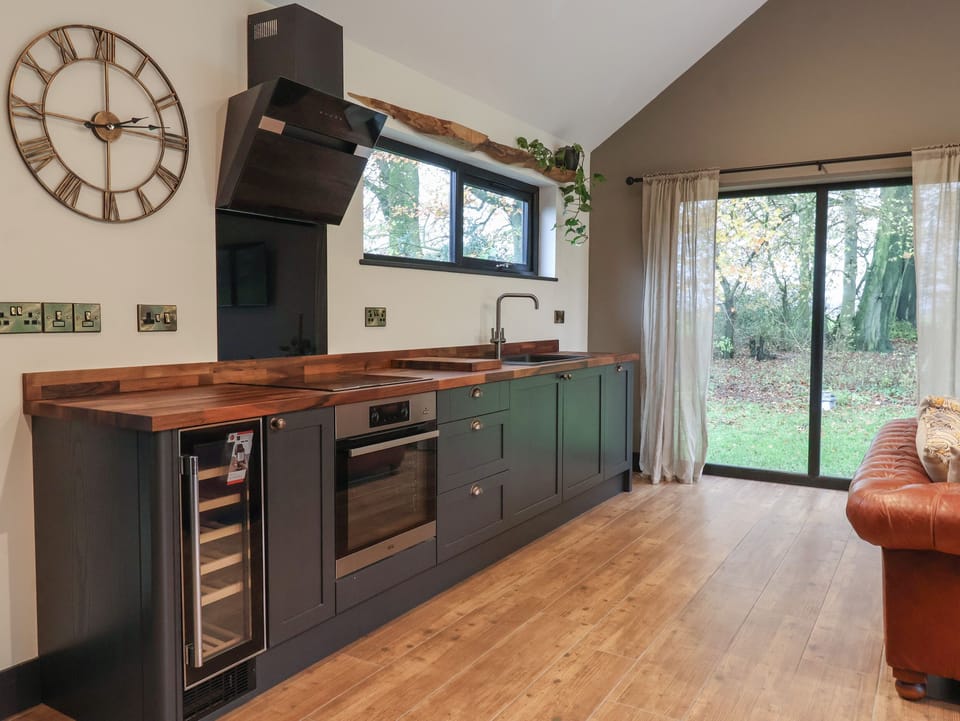 Fridge, electric kettle, toaster, cookware/dishes/utensils