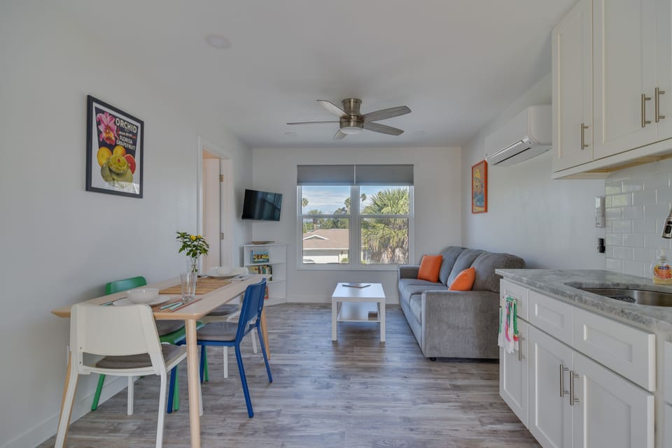 Living Room & Dining Area | In-Unit Laundry | 8 Mi to Downtown Clearwater