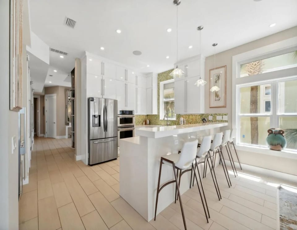 Gourmet Kitchen with quartz countertops and 5 seat breakfast bar!