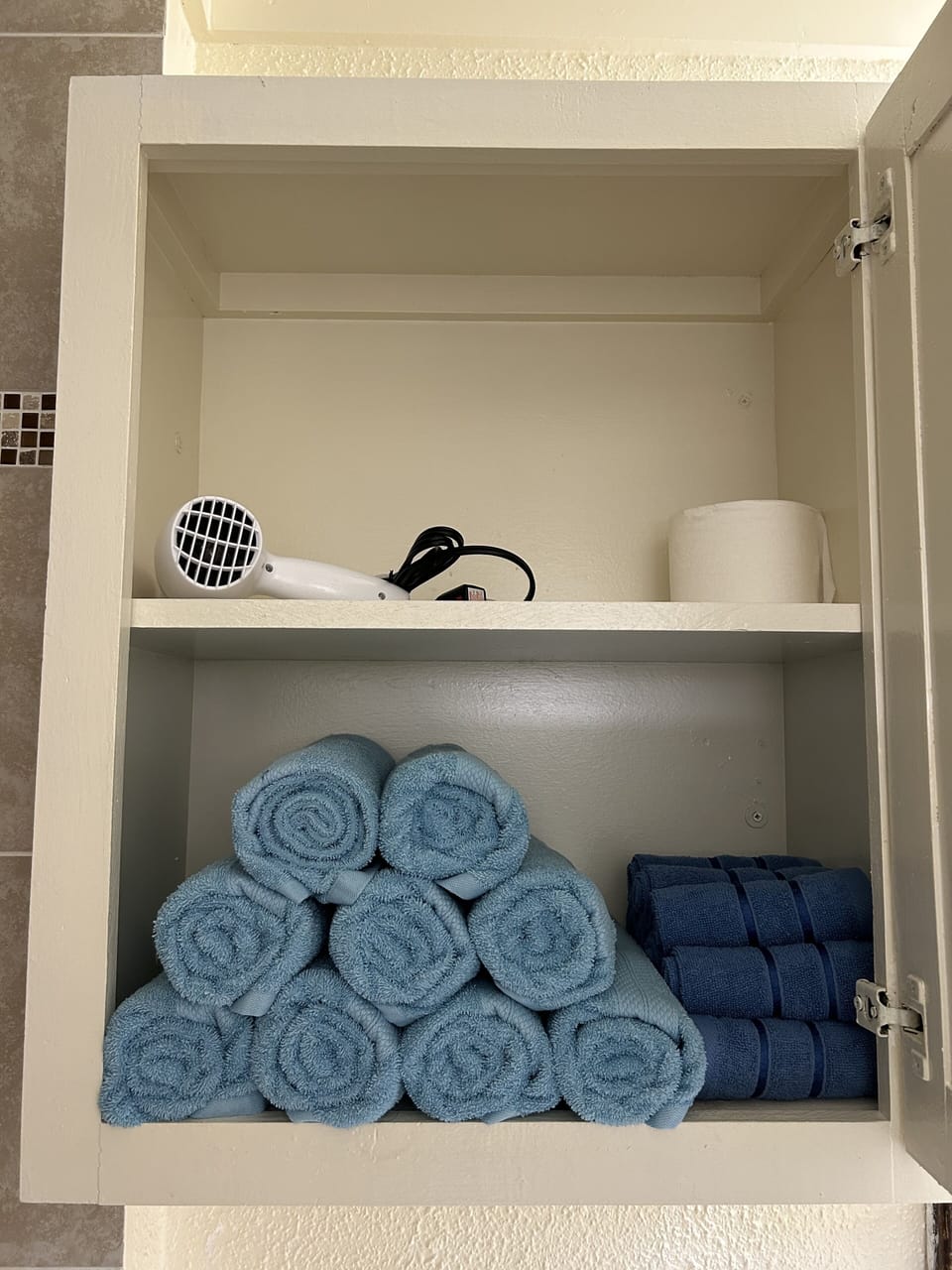 Closet in bathroom 1 with extra supplies