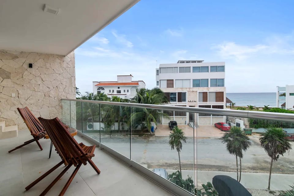 Caribbean balcony: Serene coffee mornings, sunset wine unwind.