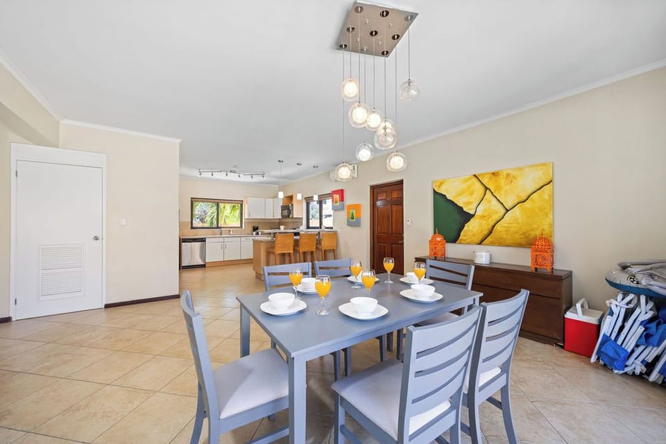 Elegance meets camaraderie at our spacious dining table, inviting you to enjoy delicious meals and create lasting connections with loved ones.