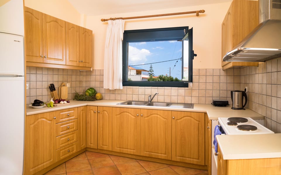 Apartment, Sea View | Private kitchen | Full-size fridge, microwave, oven, stovetop