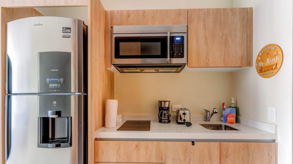 Settle into your home away from home, where comfort takes the lead.