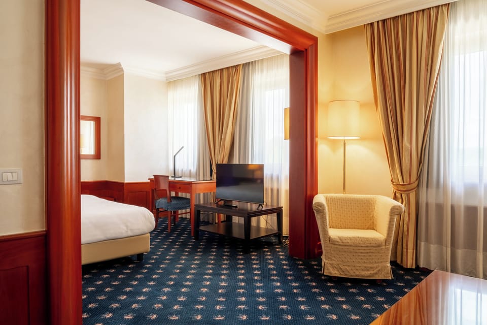 Junior Studio Suite, 1 King Bed with Sofa bed | Down comforters, in-room safe, desk, laptop workspace