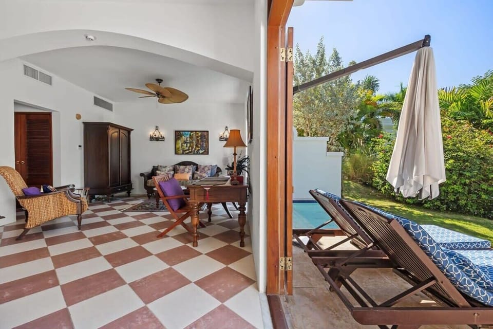 The living space opens up to the outdoor private terrace.